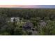 Luxury home with pool and lake view in wooded area at 36 Allenwood Look, Ormond Beach, FL 32174
