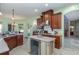 Modern kitchen with stainless steel appliances and an island with wine cooler at 36 Allenwood Look, Ormond Beach, FL 32174