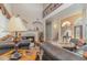 Bright living room features a fireplace, high ceilings and hardwood floors at 36 Allenwood Look, Ormond Beach, FL 32174