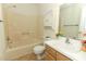 Clean bathroom with a shower/tub combo, toilet, and vanity at 4230 Meeting Pl, Sanford, FL 32773