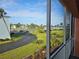 Balcony view of the community, landscaping, and water at 721 S Beach St # 217A, Daytona Beach, FL 32114