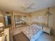 Bedroom with a double bed, mirrored closet, and tiled floor at 721 S Beach St # 217A, Daytona Beach, FL 32114