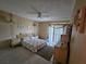 Bedroom with a double bed, wooden furniture, and tiled floor at 721 S Beach St # 217A, Daytona Beach, FL 32114