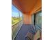 Relaxing screened balcony overlooking a lush green space at 721 S Beach St # 217A, Daytona Beach, FL 32114