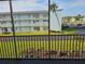 Balcony view of the community and landscaping at 721 S Beach St # 217A, Daytona Beach, FL 32114