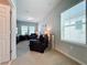 Cozy living area with comfortable seating and natural light at 9344 Tyrella Pine Trl, Winter Garden, FL 34787