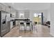 Modern kitchen with stainless steel appliances and kitchen island at 1174 Seaside Mist Trl, Kissimmee, FL 34747