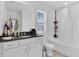 Bathroom with tub, shower, vanity, and dark countertop at 1174 Seaside Mist Trl, Kissimmee, FL 34747