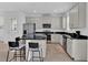 Modern kitchen with stainless steel appliances and kitchen island at 1174 Seaside Mist Trl, Kissimmee, FL 34747
