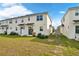Private backyard with grassy area and fence at 1174 Seaside Mist Trl, Kissimmee, FL 34747