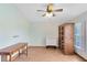 Bedroom with wood floors, built-in cabinet, and window at 3330 La Salle Ave, Saint Cloud, FL 34772