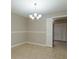 Bright dining room with tile floors and a chandelier at 404 Banyon Tree Cir # 200, Maitland, FL 32751