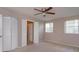Spacious bedroom with carpet, ceiling fan and large closet at 404 Banyon Tree Cir # 200, Maitland, FL 32751