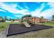 Safe playground with modern equipment and soft ground surface at 404 Banyon Tree Cir # 200, Maitland, FL 32751