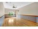 Living room with hardwood floors and a ceiling fan at 4150 Citrus St, Kissimmee, FL 34746