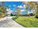 Two-story home with a metal roof and large yard at 4150 Citrus St, Kissimmee, FL 34746