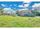 Property with various outbuildings, including a workshop and shed at 4150 Citrus St, Kissimmee, FL 34746