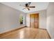 Hardwood floors and a ceiling fan highlight this bedroom at 4150 Citrus St, Kissimmee, FL 34746