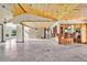 Open dining room with wood ceiling and tile floor at 4150 Citrus St, Kissimmee, FL 34746