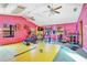 Bright home gym featuring exercise equipment and a workout area at 4150 Citrus St, Kissimmee, FL 34746