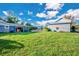 Several outbuildings including a garage and storage shed at 4150 Citrus St, Kissimmee, FL 34746