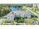 Wide aerial view of building near a lake at 770 Siena Palm Dr # 305, Celebration, FL 34747