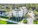 Three-story building with white siding, balconies, and palm trees at 770 Siena Palm Dr # 305, Celebration, FL 34747