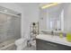 Modern bathroom with a large shower and gray vanity at 770 Siena Palm Dr # 305, Celebration, FL 34747