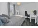Cozy bedroom with a comfortable bed and a workspace at 770 Siena Palm Dr # 305, Celebration, FL 34747