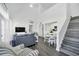 Open-concept living space with high ceilings and hardwood floors at 770 Siena Palm Dr # 305, Celebration, FL 34747