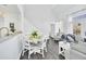 Open living room with gray sofas and a view from the balcony at 770 Siena Palm Dr # 305, Celebration, FL 34747