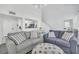Bright living room with comfy sofas and a view to the kitchen at 770 Siena Palm Dr # 305, Celebration, FL 34747