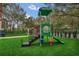 Modern playground with slides and climbing structure at 770 Siena Palm Dr # 305, Celebration, FL 34747