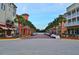 Lined with shops and palm trees, a charming town square at 770 Siena Palm Dr # 305, Celebration, FL 34747
