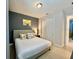Spacious bedroom with a king bed and lots of natural light at 7763 Westland Dr, Kissimmee, FL 34747