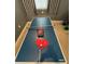 Ping pong table with paddles and balls at 7763 Westland Dr, Kissimmee, FL 34747