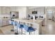 Modern kitchen with stainless steel appliances and an island at 1117 Star Ruby Ln, Winter Haven, FL 33880