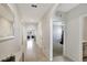 Bright and spacious entryway with tile flooring, high ceilings, and views into the living areas at 1117 Star Ruby Ln, Winter Haven, FL 33880