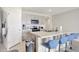 Modern kitchen with stainless steel appliances and an island at 1117 Star Ruby Ln, Winter Haven, FL 33880