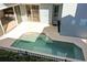 Private heated pool with patio and surrounding landscaping at 1474 Fairview Cir, Kissimmee, FL 34747