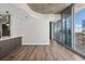 Bright living room with hardwood floors and city views at 155 S Court Ave # 1912, Orlando, FL 32801