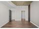 Spacious bedroom with hardwood floors and access to closets at 155 S Court Ave # 1912, Orlando, FL 32801