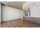 Open concept living area with modern kitchen and breakfast bar at 155 S Court Ave # 1912, Orlando, FL 32801