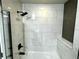 Clean bathroom with marble tile and a walk-in shower at 155 S Court Ave # 1912, Orlando, FL 32801