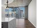 Living room with floor-to-ceiling windows offering stunning city views at 155 S Court Ave # 1912, Orlando, FL 32801