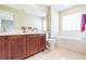 Bathroom with double vanity, garden tub, and tile flooring at 2047 Island Brook Ln, Orlando, FL 32824