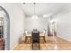 Bright dining room with glass-top table and four chairs at 2913 Elbib Dr, Saint Cloud, FL 34772