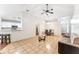 Living room with tiled floors, ceiling fan and open layout at 2913 Elbib Dr, Saint Cloud, FL 34772