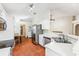 Bright kitchen with stainless steel appliances and white cabinets at 2913 Elbib Dr, Saint Cloud, FL 34772