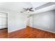 Spacious bedroom featuring wood floors and a large closet at 2913 Elbib Dr, Saint Cloud, FL 34772